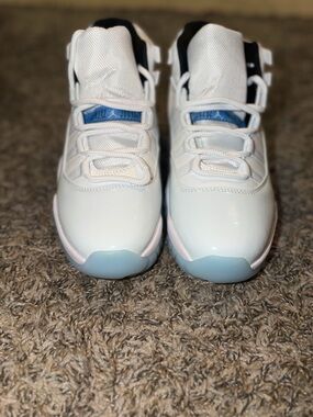Jordan 11’s White Sneakers with Light Blue and Black Accents